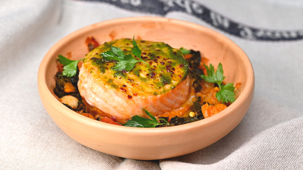 Terra Cotta dish of Chilean Salmon stewed with Vegetables